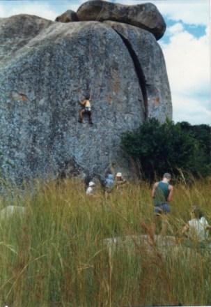 Me climbing at the Balancing rocks about 1991 (both in in a greener state). Zoomed in, I notice the most awesome, respected Jack Robinson in striped shirt: One of very few people to mitigate the wreck of my secondary school education.