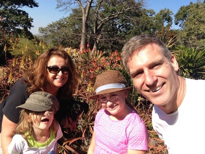 My wife Shaunagh, and my two daughters Hannah and Eden with me at Ewanrigg Botanical Gardens near Harare.
