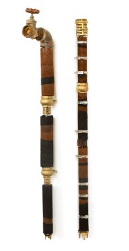 Pipe Dreams I and II, 2016. Charcoal, Soil, Metal and Found Objects. Height 115 and 110 cm